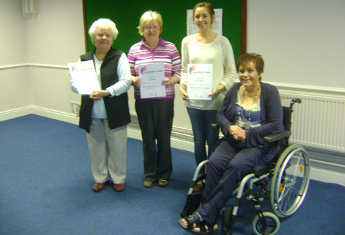 Volunteers with Cookstown M.S. Help and Support receive volunteer certs from Denise for all their hard work; from left - Una Teague, Molly Dingley and Lauren Gallagher